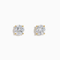 The Star Lab Grown Diamond Stud Earrings in 18K yellow gold feature round, clear lab diamonds in prong settings, shown against a white background.