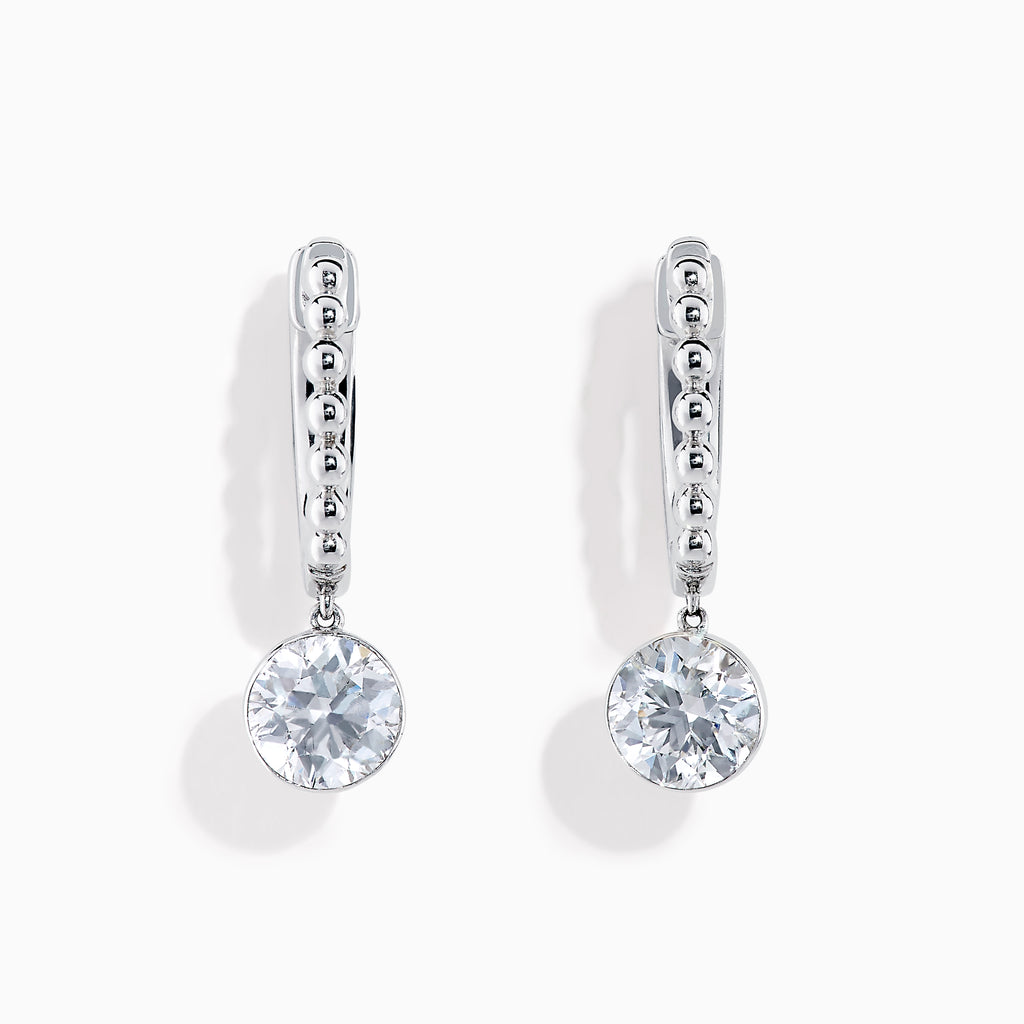 The Star Lab Grown Diamond Beaded Hoop Solitaire Drop Earrings in 18K White Gold feature a round lab-grown diamond dangling from each hoop, photographed on a white background.