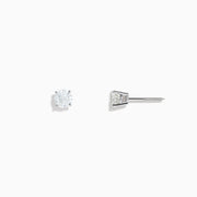 The 14K White Gold Diamond Solitaire Stud Earrings, 0.75 TCW, feature small round diamonds in silver prongs and are shown on a plain white background.
