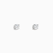 The 14K White Gold Diamond Solitaire Stud Earrings, 1.0 TCW, feature round diamonds in silver prongs and are shown on a plain white background.