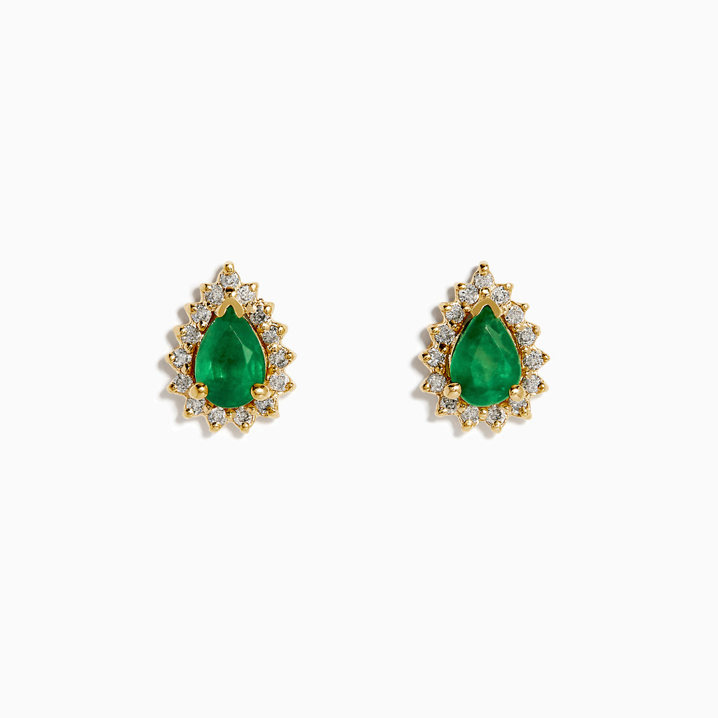 The 14K Yellow Gold Pear Emerald and Diamond Halo Stud Earrings showcase teardrop green emeralds encircled by sparkling diamonds in a floral design.