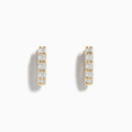 DOro 14 Karat Yellow Gold 5/8 Diamond Hoop Earrings with a total carat weight of 0.98, each set with five sparkling diamonds, displayed against a white background.