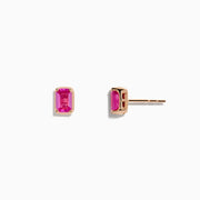 The 14K Rose Gold Pink Sapphire Earrings feature small rectangular pink sapphires set in rose gold, shown on a plain white background.