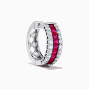 The 14K White Gold Ruby and Diamond Huggie Earrings feature a central row of square-cut red rubies, flanked by rows of round diamonds for extra brilliance.
