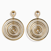 The 14K Yellow Gold Diamond Concentric Circle Drop Earrings feature sparkling diamond-outlined rings with single diamonds at the center and top—an elegant choice for any occasion.