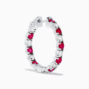 The 14K White Gold Ruby & Diamond Hoop Earrings, 3.58 TCW, feature alternating rubies and diamonds set in white gold hoops, shown on a white background.