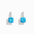 A pair of 14K White Gold Blue Topaz and Diamond Drop Earrings, featuring cushion-cut blue topaz and a row of diamonds on the hooks, displayed on a white background.