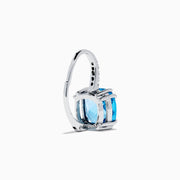 A pair of 14K White Gold Blue Topaz and Diamond Drop Earrings, featuring cushion-cut blue topaz and a row of diamonds on the hooks, displayed on a white background.