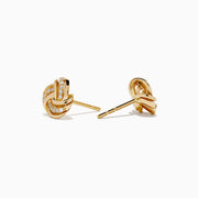 The 14K Yellow Gold Diamond Love Knot Earrings feature a delicate knot design accented with sparkling diamonds, shown against a plain white background.