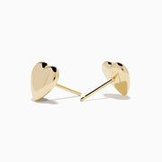 14K Yellow Gold Puffed Heart Stud Earrings shown against a plain white background.