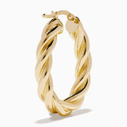 A pair of 14K Yellow Gold Twist Tube Oblong Earrings displayed on a plain white background.