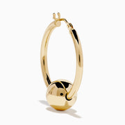 A pair of 14K yellow gold tube hoops with bead accents, displayed against a plain white background.