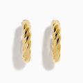 The 14K Yellow Gold Twist Hoop Earrings are shown against a white background, with soft shadows cast to the left.