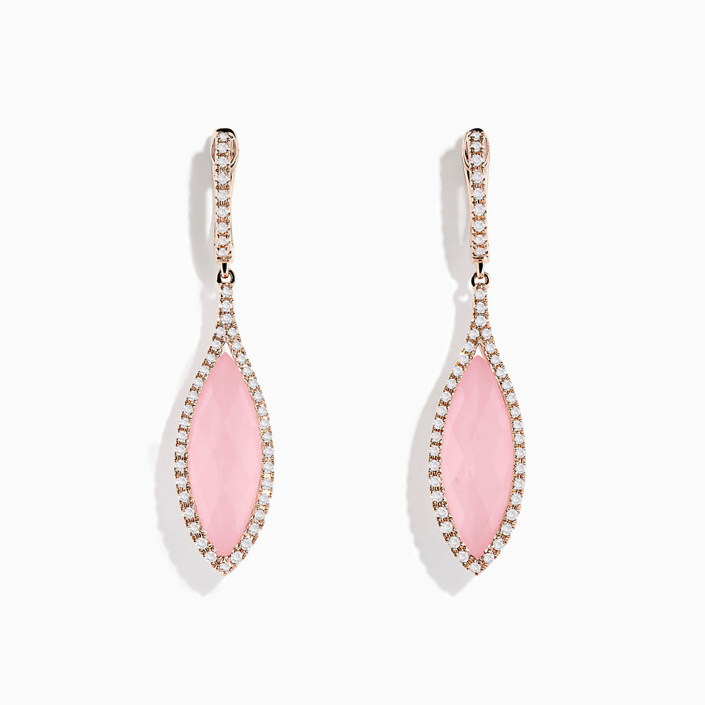 These 14K Rose Gold Rose Quartz and Diamond Earrings feature elegant marquise-shaped rose quartz stones bordered by sparkling diamonds, set in rose gold.