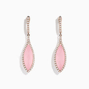 These 14K Rose Gold Rose Quartz and Diamond Earrings feature elegant marquise-shaped rose quartz stones bordered by sparkling diamonds, set in rose gold.
