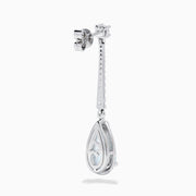 Elegant 14K white gold linear drop earrings featuring teardrop-shaped aquamarine gemstones, accented with diamonds.