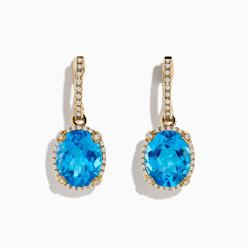 14K Yellow Gold Blue Topaz and Diamond Drop Earrings featuring large oval blue topaz gemstones surrounded by diamonds, with additional diamonds set along the ear hooks, displayed on a white background.