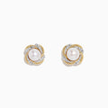 A pair of 14K yellow gold scalloped edge stud earrings featuring a central freshwater pearl, accented with diamonds, set against a white background.