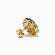 The Ocean Bleu 14K Yellow Gold Blue Topaz and Diamond Earrings showcase an oval blue topaz center, accented by smaller blue stones and sparkling diamonds, set in yellow gold and presented against a white background.