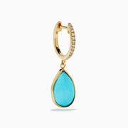 The 14K Yellow Gold Turquoise and Diamond Drop Earrings feature teardrop turquoise stones and sparkling diamonds along the hooks, shown on a white background.