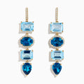 The 14K Yellow Gold Blue Topaz and Diamond Drop Earrings feature square and teardrop blue topaz gems, accented by sparkling diamonds for a layered, elegant look.