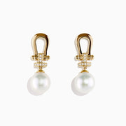 14K Yellow Gold Fresh Water Pearl and Diamond Horseshoe Drop Earrings with sparkling accents and large round pearls, elegantly displayed on a plain white background.