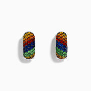 The 925 Sterling Silver Multi Color Sapphire Huggie Earrings feature small sapphires in yellow, orange, blue, green, and red, set in a gradient pattern against a white background.
