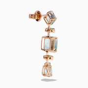These 14K rose gold earrings feature square, rectangular, and teardrop-shaped green amethyst and peridot gemstones in light blue and green.