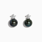 These 14K White Gold Tahitian Pearl and Diamond Earrings feature 9-10 mm round Tahitian pearls accented by a floral cluster of sparkling diamonds, set in white gold.