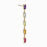The Mosaic 14K Yellow Gold Multi Color Linear Drop Earrings showcase four vertically arranged rectangular gemstones—purple, blue, green, and orange—set in yellow gold against a white background.