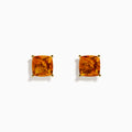 The Sunset 14K Yellow Gold Citrine Stud Earrings feature cushion-cut orange gemstones, displayed on a white background—an elegant choice for any occasion.