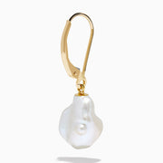 The 14K Yellow Gold Fresh Water Keshi Pearl Drop Earrings feature large, irregular Keshi pearls suspended from simple gold hooks, shown against a plain white background.