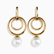 The 14K Yellow Gold Fresh Water Pearl Dangle Earrings feature a double circular design with luminous freshwater pearl drops, shown against a white background.