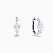 The Lab Grown Diamond Marquise Huggie Earrings in 14K White Gold are shown against a plain white background.