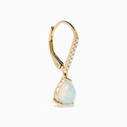 Aurora 14K Yellow Gold Opal and Diamond Dangle Earrings feature teardrop opals hanging from curved hooks with round diamonds, shown on a white background.