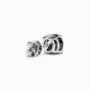A pair of 14K white gold black diamond 4.00ct solitaire stud earrings with four-prong settings, shown against a plain white background.