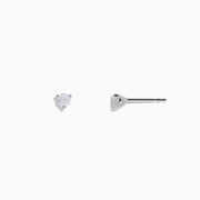 A pair of 14 karat white gold stud earrings featuring 0.33TCW round diamonds, shown in a minimalist prong setting against a plain white background.
