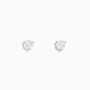 A pair of 14 Karat White Gold Diamond Stud Earrings with 1.00TCW round diamonds is displayed on a plain white background.