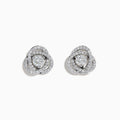 The 18K White Gold Diamond Love Knot Stud Earrings feature interlocking loops with sparkling diamonds and a central pear-shaped diamond, all set in elegant white gold against a plain white background.