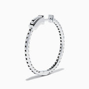 The Pave Classica 14K White Gold Diamond Hoop Earrings, encrusted with sparkling diamonds, are shown against a white background with soft shadows cast to the left.