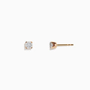A pair of 14K White & Rose Gold Diamond Solitaire Stud Earrings (0.10 TCW) with gold prong settings—one shown front, one from the side—displayed against a plain white background.