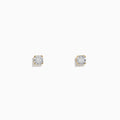 A pair of 14K two tone white & yellow gold diamond solitaire stud earrings, 0.10 TCW, shown on a plain white background.