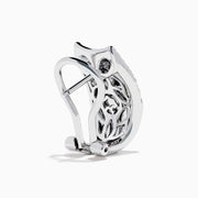 A pair of 925 Sterling Silver Diamond Accented Huggie Earrings, featuring sparkling diamond accents, is displayed on a plain white background.
