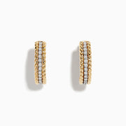 The Duo 14K Two Tone Gold 5/8 Diamond Hoop Earrings feature a twisted rope design and a vertical row of sparkling diamonds at the center.
