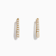 A pair of Effy Doro 14K Yellow 3/4 Diamond Hoop Earrings (0.49 TCW) are displayed upright against a plain white background, each featuring a row of sparkling diamonds along the front.