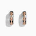 The 14K Two-Tone Gold Pink and White Diamond Huggie Earrings feature marquise-shaped pink gems set in gold on a silver base, accented by white stones, shown against a white background.