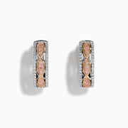 The 14K Two-Tone Gold Pink and White Diamond Huggie Earrings feature marquise-shaped pink gems set in gold on a silver base, accented by white stones, shown against a white background.