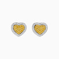 The Canare 18K Two Tone Gold White and Yellow Diamond Heart Earrings feature a yellow diamond center surrounded by white diamonds in an elegant heart design for a timeless, radiant look.