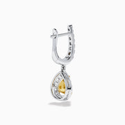 The 18K Two Tone Gold White and Yellow Diamond Drop Earrings feature teardrop-shaped yellow gems encircled by white diamonds, set in two tone gold, with diamond-studded hooks for extra brilliance.