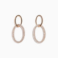 The Pave Rose 14K Rose Gold Diamond Interlock Earrings feature a small smooth oval linked to a larger diamond-encrusted oval, all elegantly crafted in 14K rose gold and displayed against a plain white background.